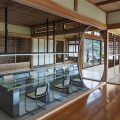 時間谷創(chuàng)意大廈日式原木風(fēng)辦公室裝修方案 超大圓形造型鏡